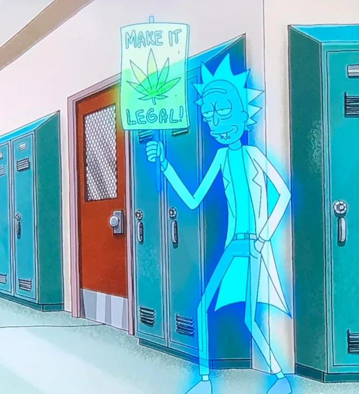 Screenshot of an episode of Rick and Morty, where a holographic Rick holds up a sign reading "Make it legal" with a weed leaf.